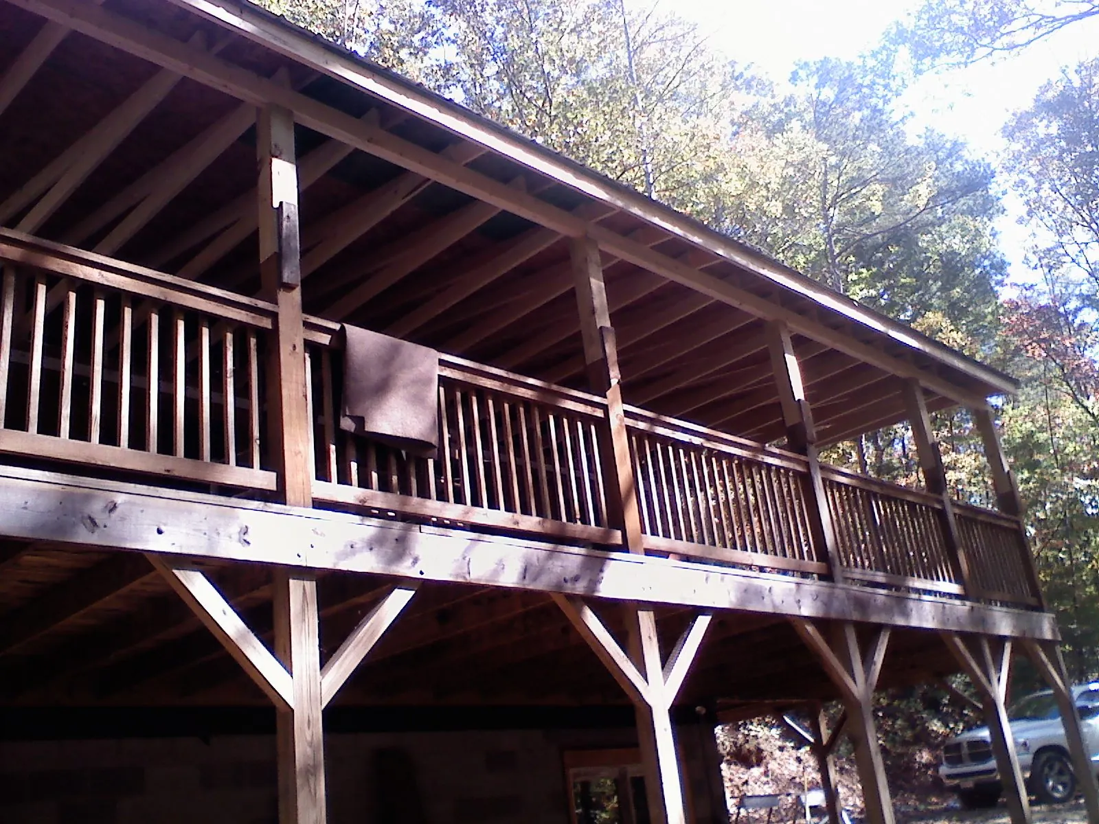 Timber framing under a new elevated porch and deck — Roof Leak Repair in Searsboro by Roofing Brothers
